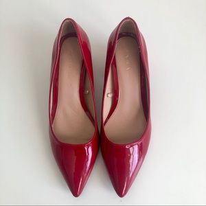 Red faux leather heels